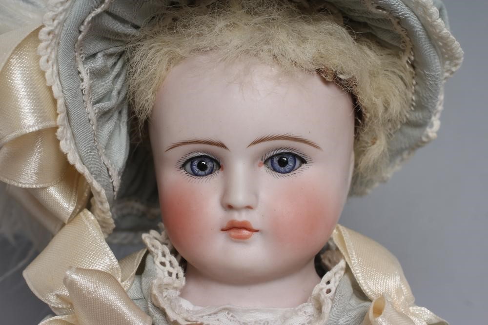 A German bisque shoulder head doll Image