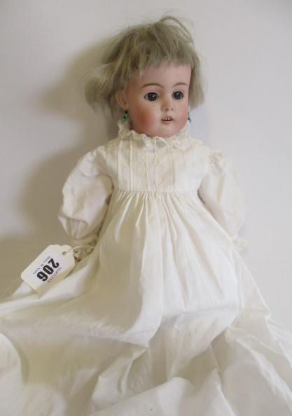 A German bisque shoulder head doll Image