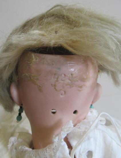 A German bisque shoulder head doll Image