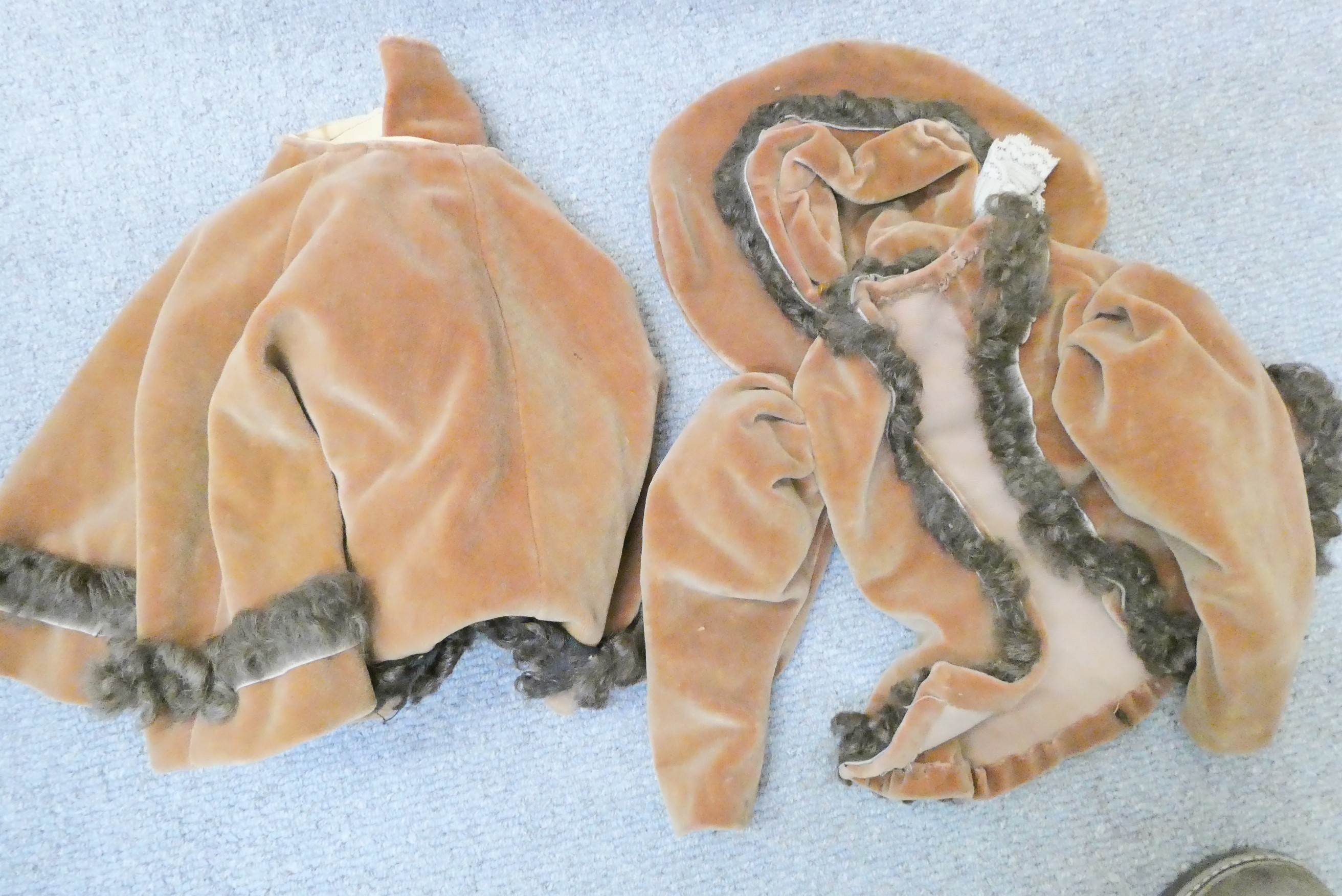 A large quantity of good quality doll's clothing Image