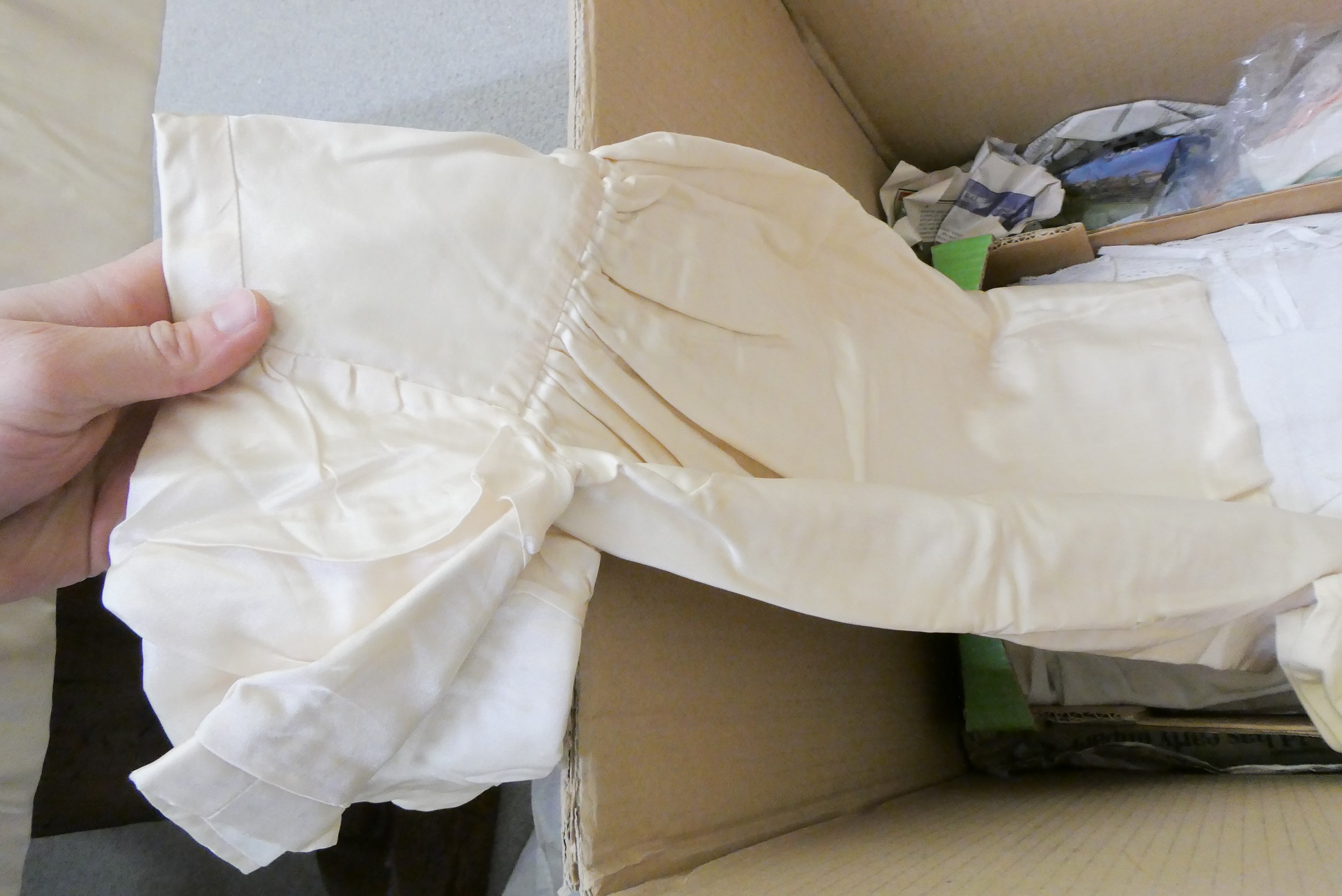 A large quantity of good quality doll's clothing Image