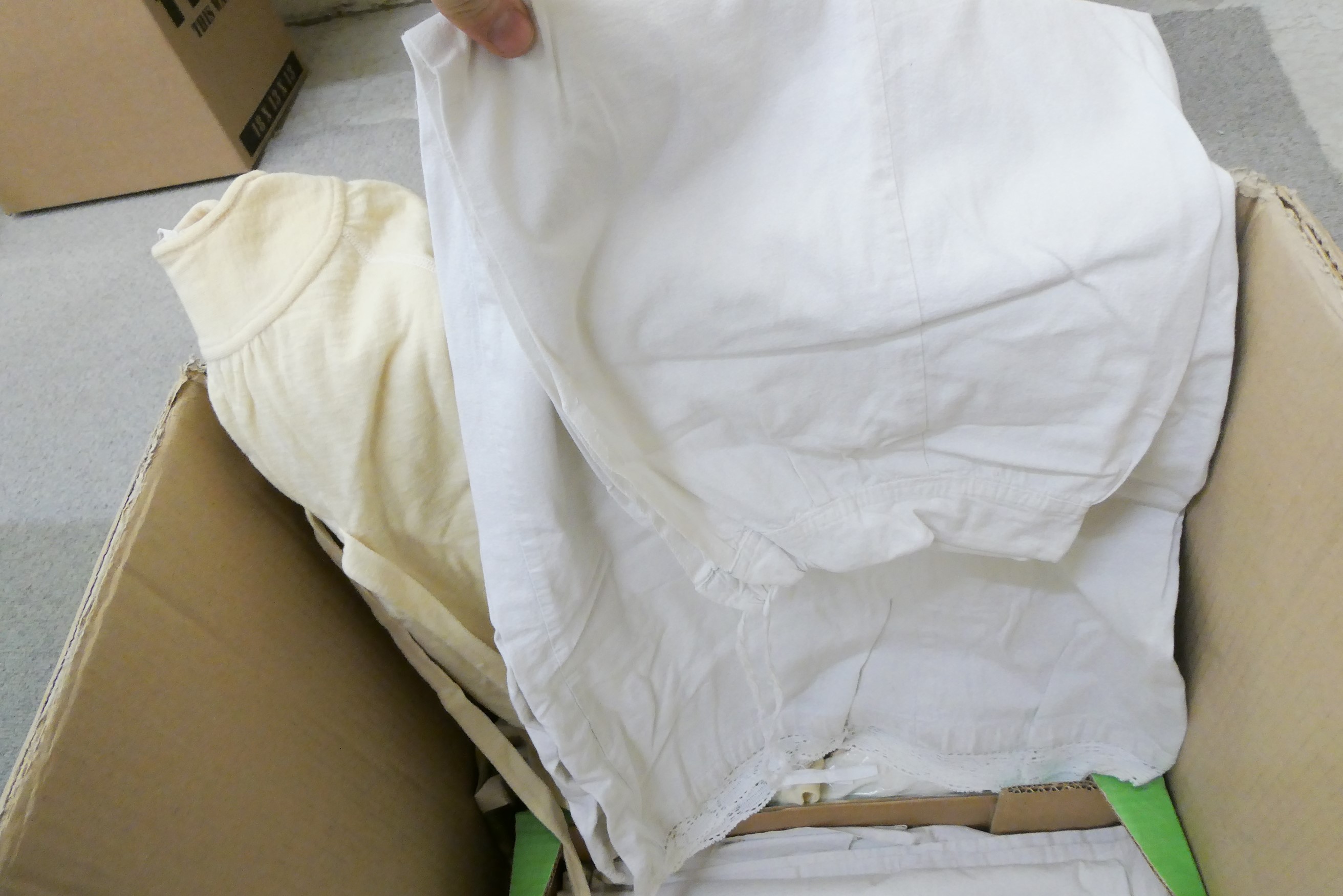 A large quantity of good quality doll's clothing Image