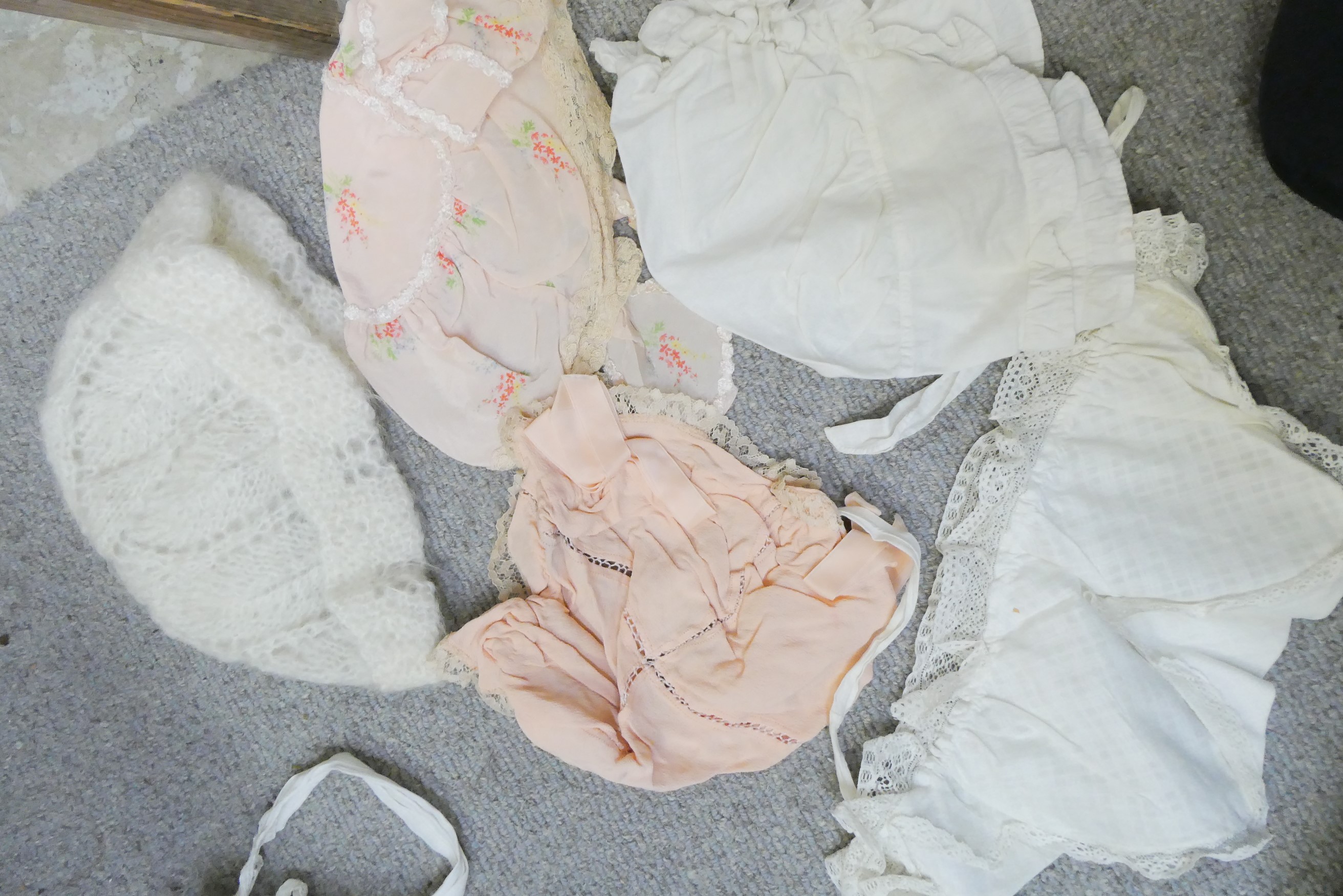 A large quantity of good quality doll's clothing Image