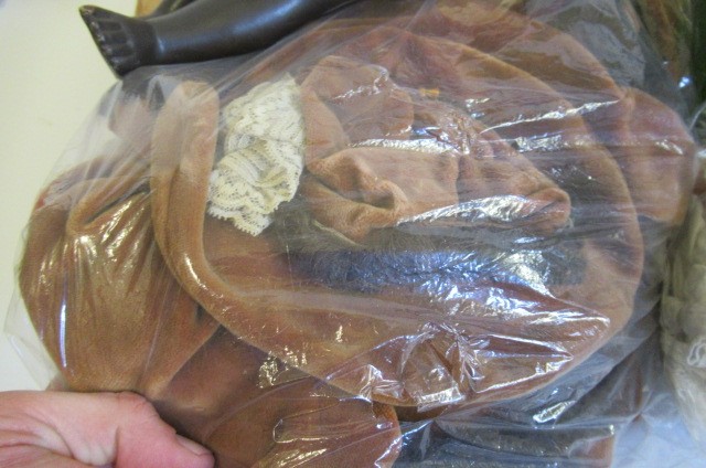 A large quantity of good quality doll's clothing Image