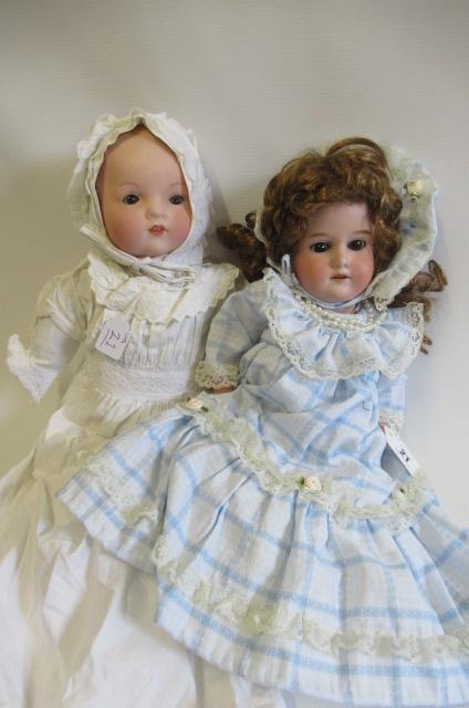 Two bisque socket head dolls Image
