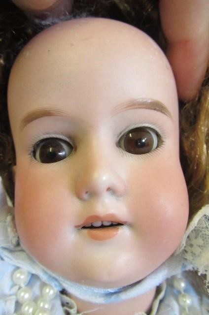 Two bisque socket head dolls Image