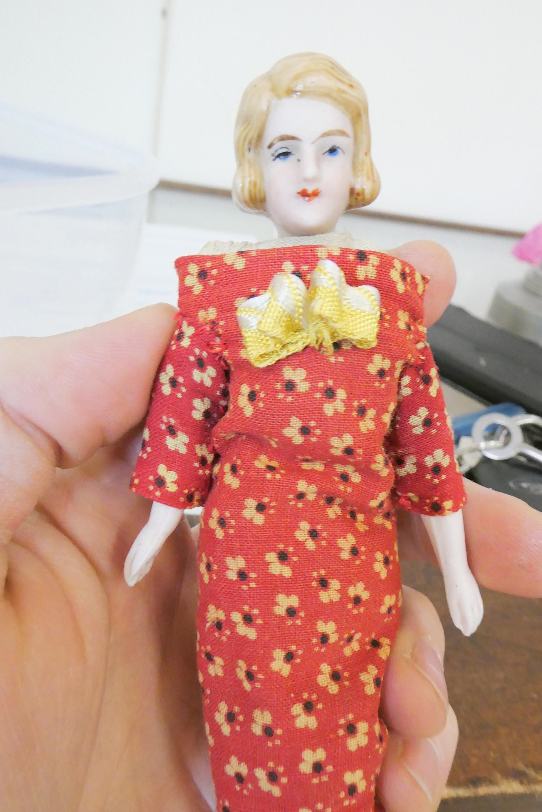 Eight doll's house dolls Image