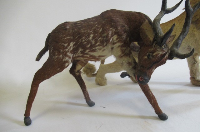 Two real hair plush animals Image