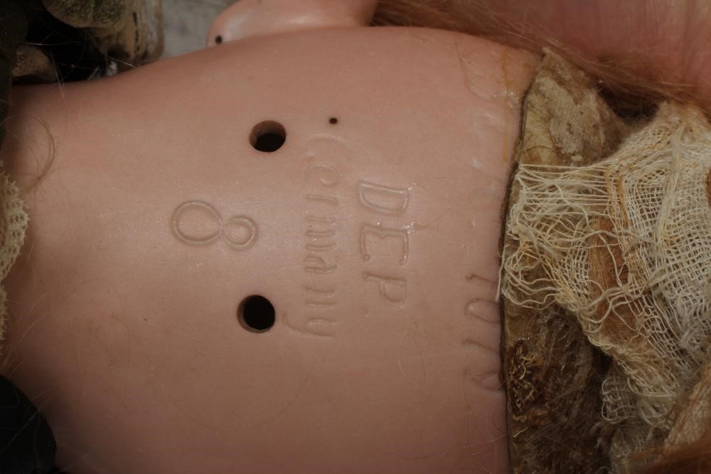 A Simon & Halbig bisque socket head doll Image