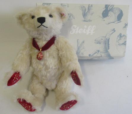 A boxed Steiff Nicholas teddy bear Image