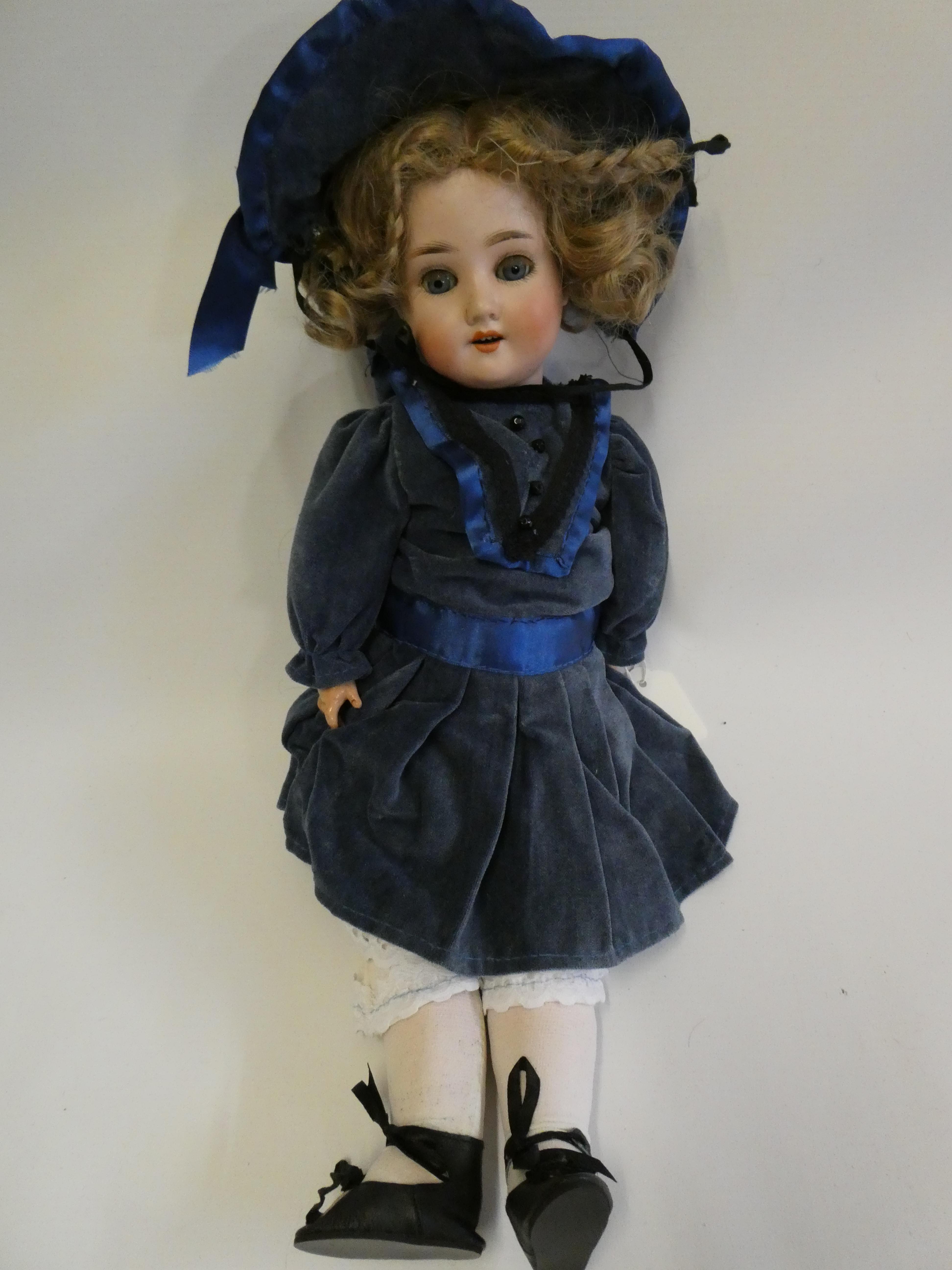 A Schoenau & Hoffmeister bisque socket head doll Image