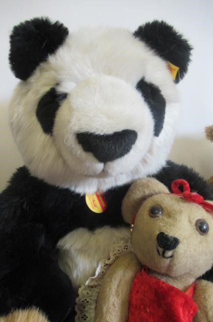 Eleven collector's teddy bears Image