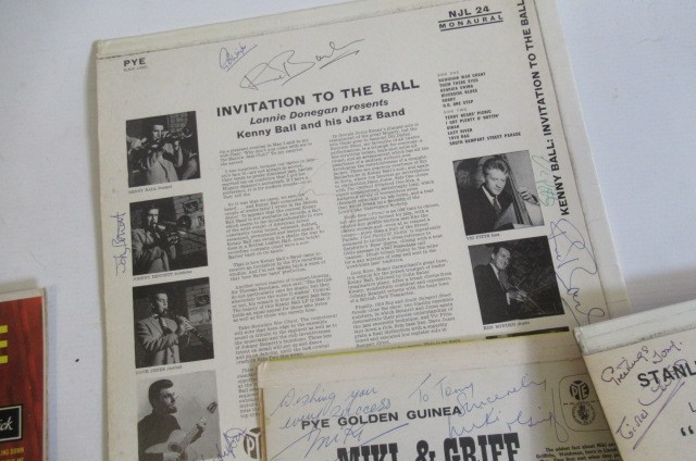 Six signed record slips Image
