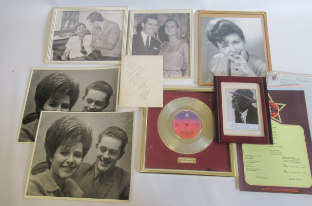 A collection of autographed photographs Image