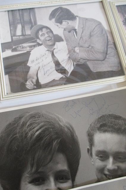 A collection of autographed photographs Image