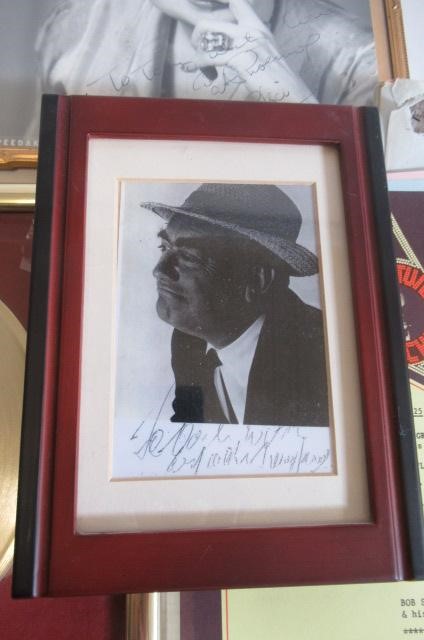 A collection of autographed photographs Image