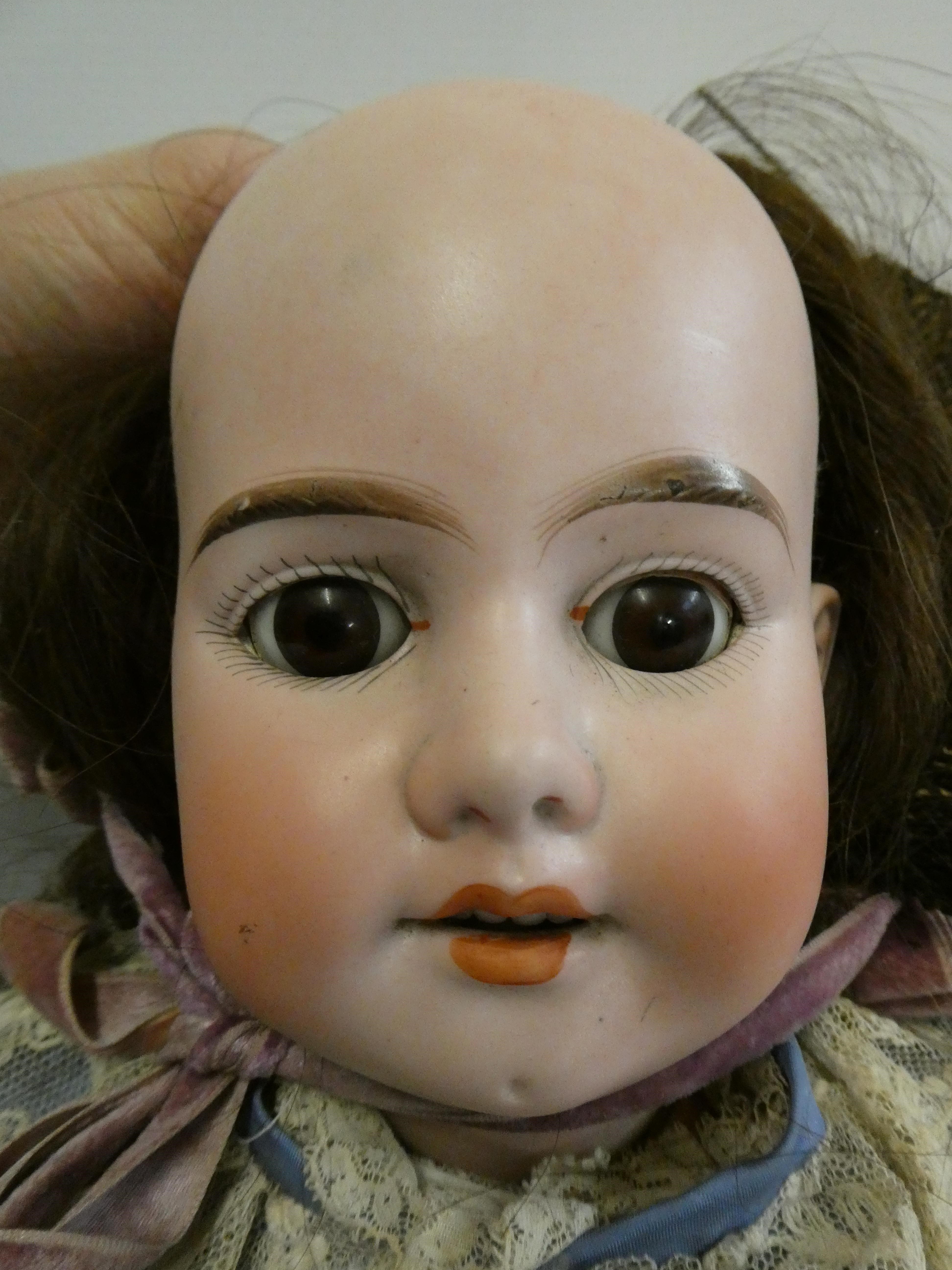 An Armand Marseille bisque socket head doll Image