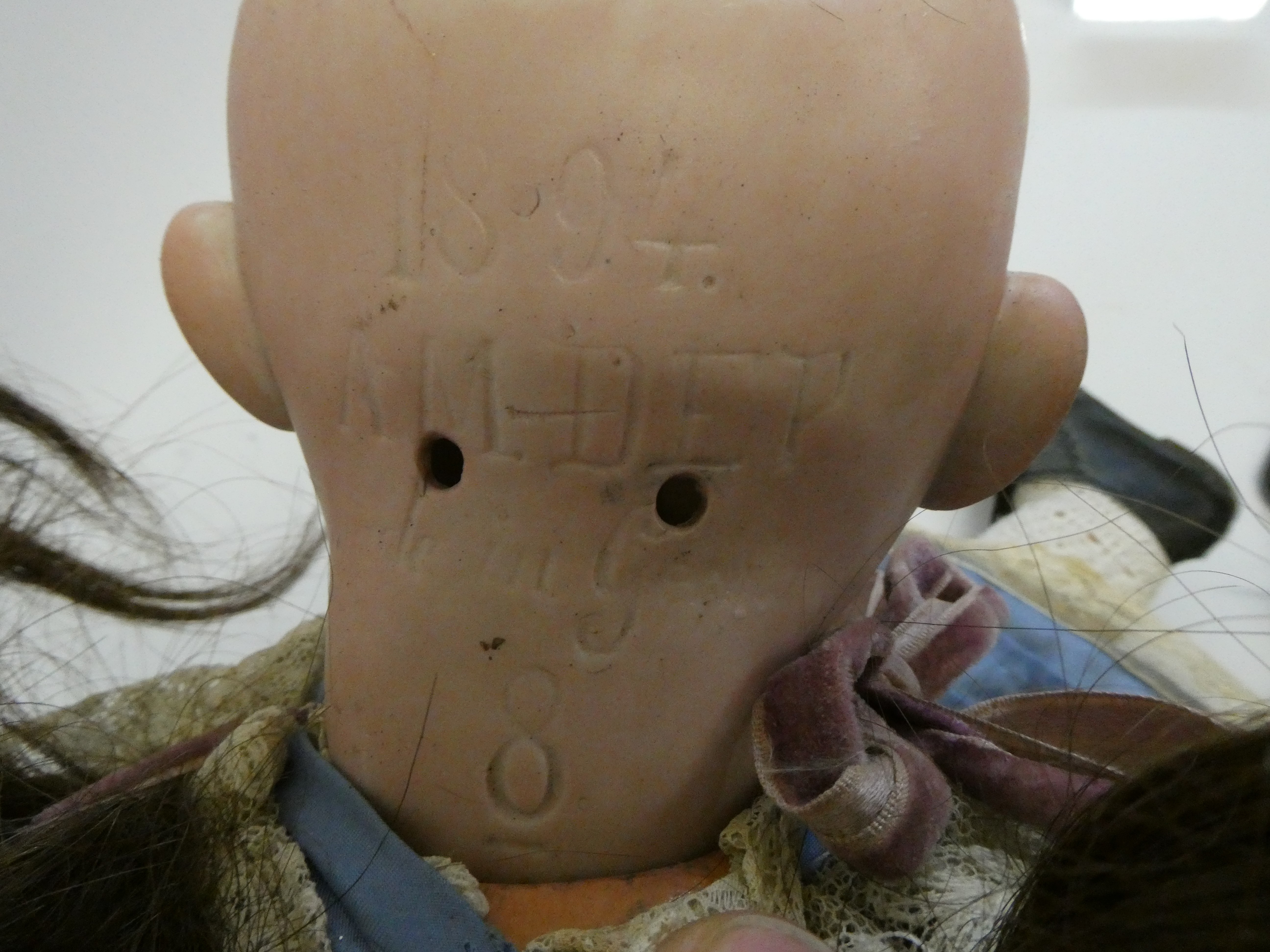 An Armand Marseille bisque socket head doll Image