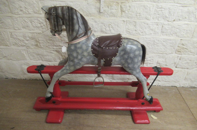 An antique rocking horse Image