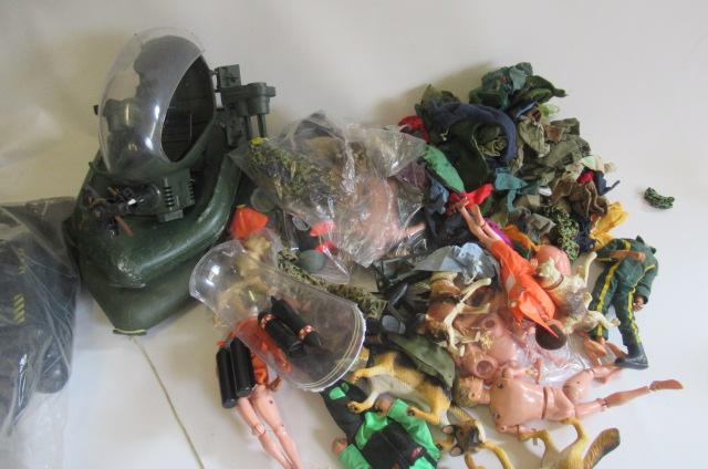 A large quantity of playworn Action Man dolls and equipment including clothing Image