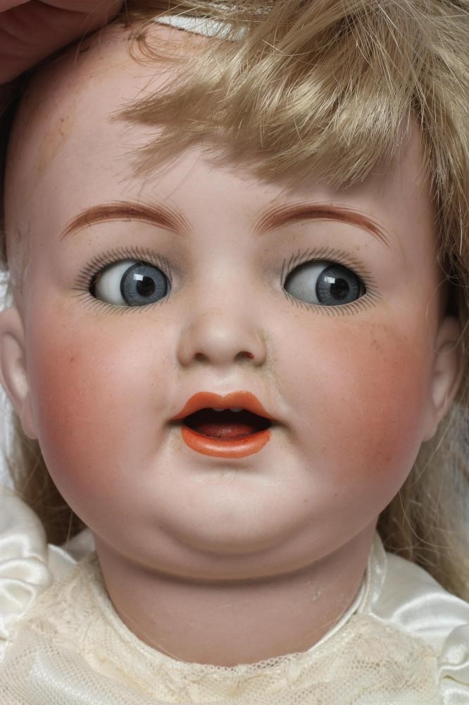 A Kammer & Reinhardt bisque socket head flirty character doll Image