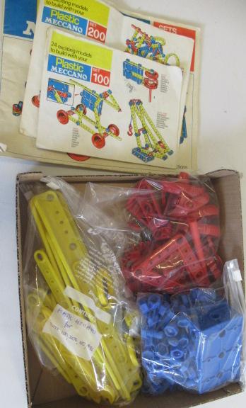 Plastic Meccano parts and instruction books Image