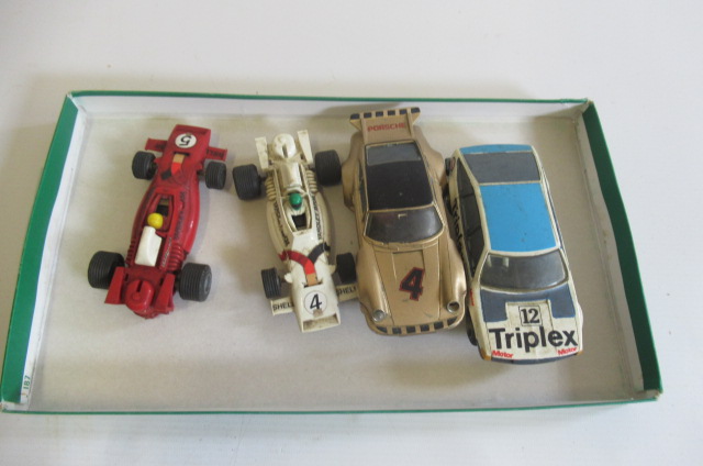 Four playworn Scalextric cars including Rover 3000 and Porsche Image