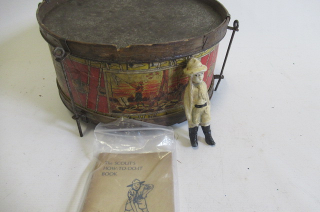 A composite cast boy scout figure and How To Do It book Image