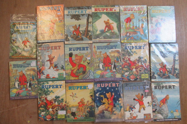 Sixteen Daily Express Rupert Annuals from 1970 Image