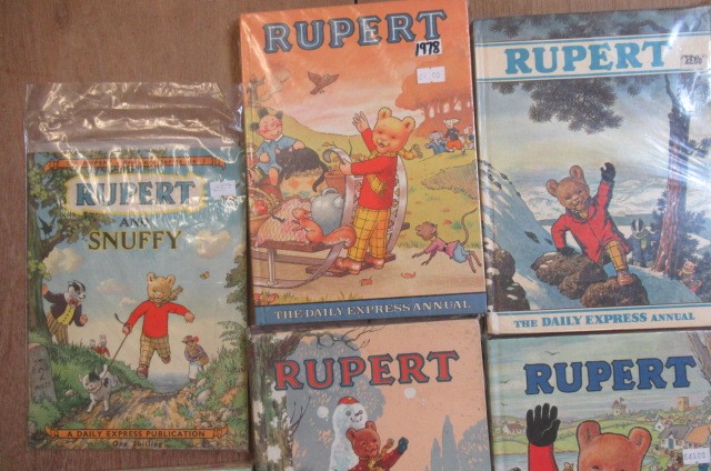 Sixteen Daily Express Rupert Annuals from 1970 Image