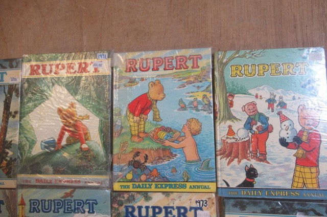 Sixteen Daily Express Rupert Annuals from 1970 Image