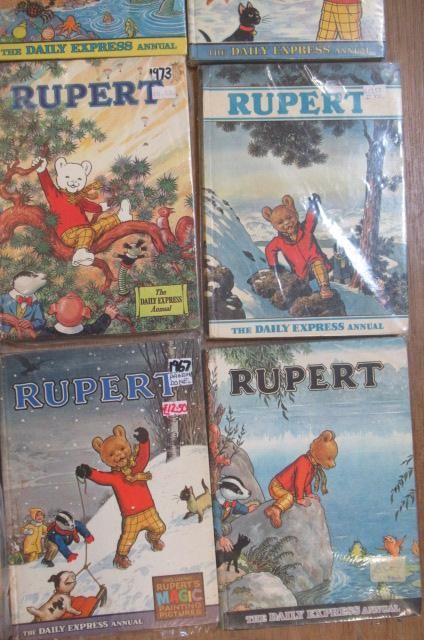 Sixteen Daily Express Rupert Annuals from 1970 Image