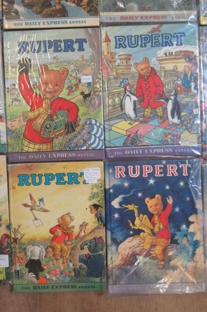 Sixteen Daily Express Rupert Annuals from 1970 Image