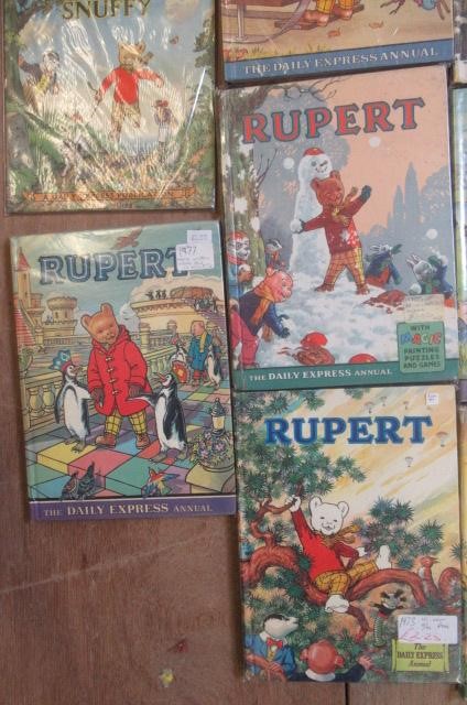 Sixteen Daily Express Rupert Annuals from 1970 Image