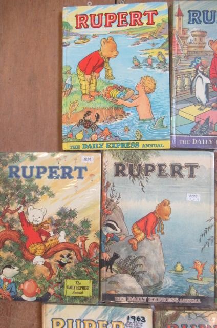 Sixteen Daily Express Rupert Annuals from 1970 Image