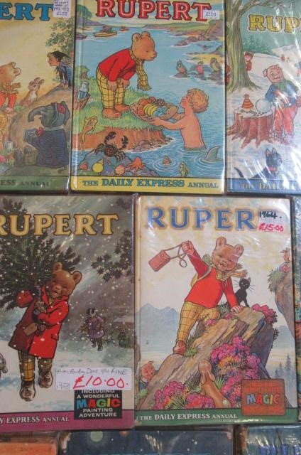 Sixteen Daily Express Rupert Annuals from 1970 Image