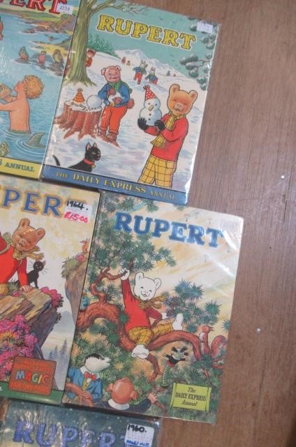 Sixteen Daily Express Rupert Annuals from 1970 Image