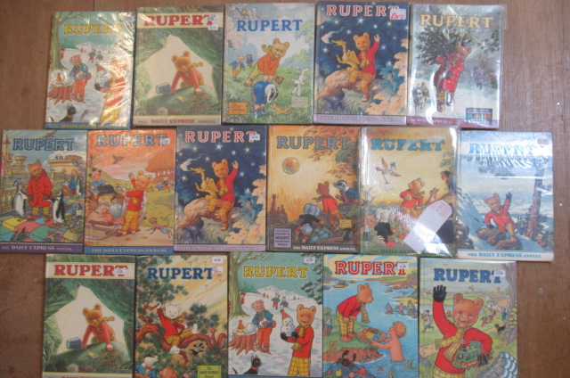 Sixteen Daily Express Rupert Annuals from 1970 Image
