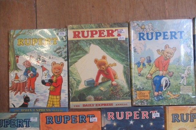 Sixteen Daily Express Rupert Annuals from 1970 Image