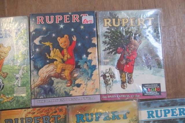 Sixteen Daily Express Rupert Annuals from 1970 Image
