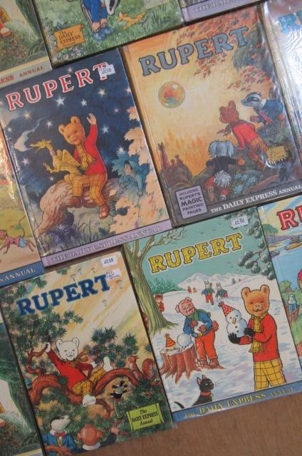 Sixteen Daily Express Rupert Annuals from 1970 Image