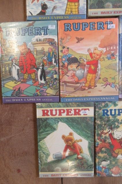 Sixteen Daily Express Rupert Annuals from 1970 Image