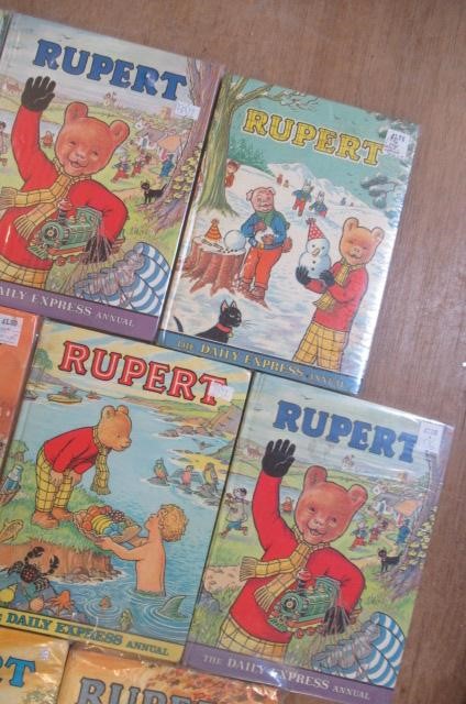 Sixteen Daily Express Rupert Annuals from 1970 Image