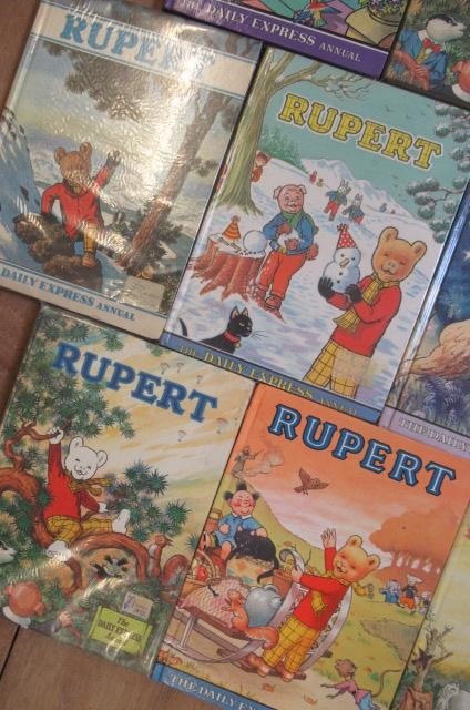 Sixteen Daily Express Rupert Annuals from 1970 Image