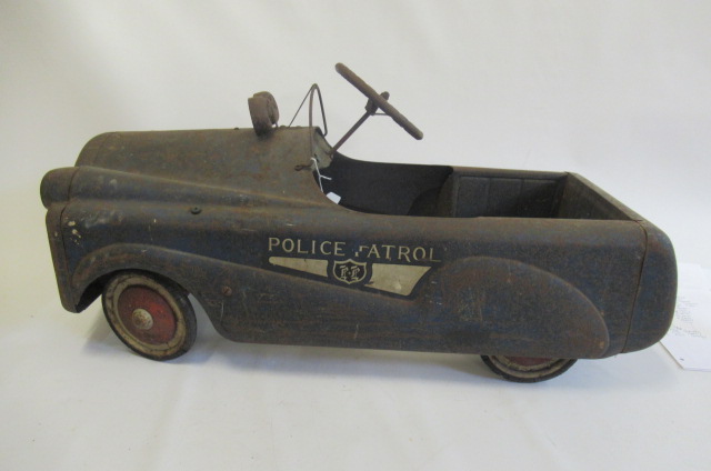 A pressed steel police patrol pedal car Image