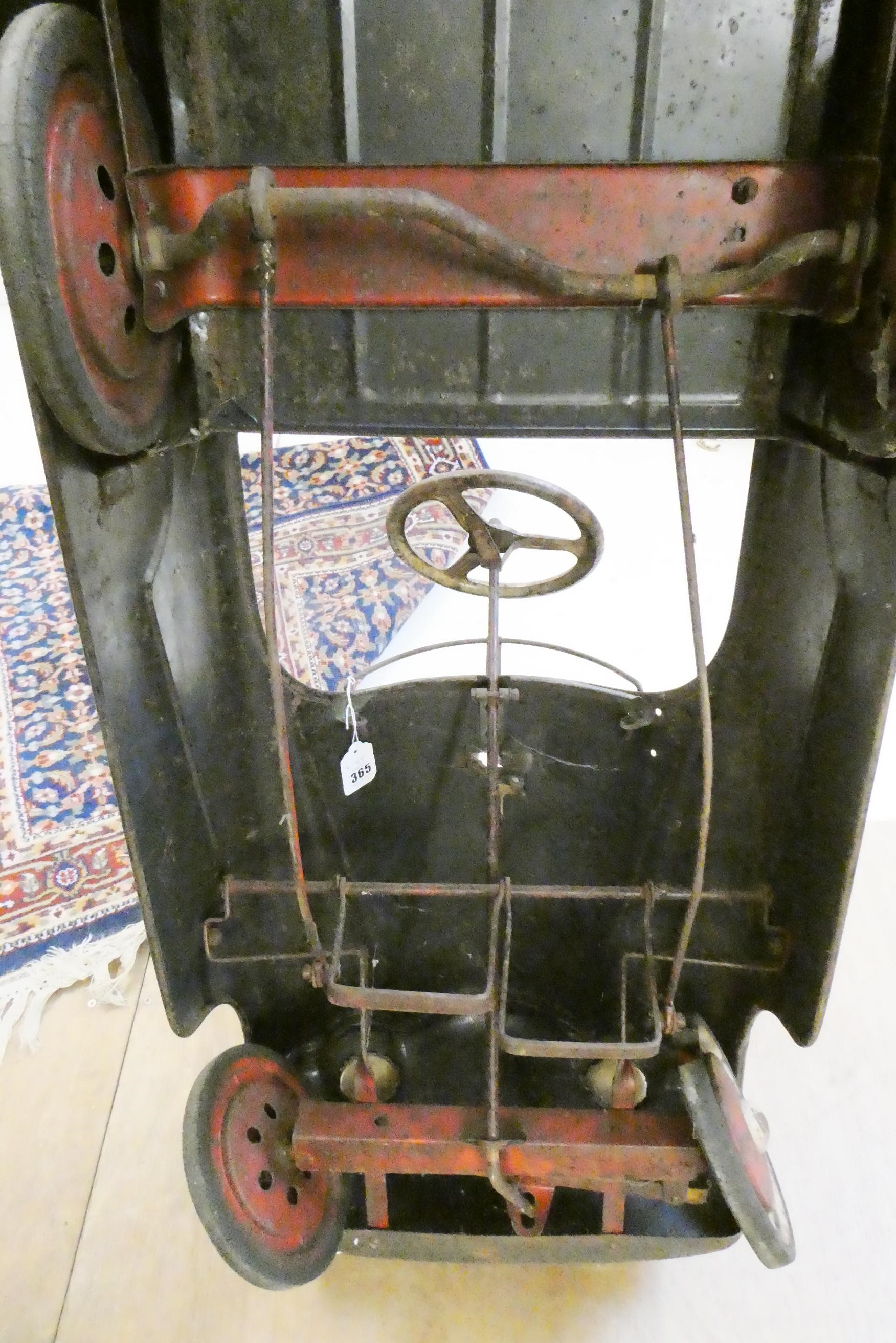 A pressed steel police patrol pedal car Image