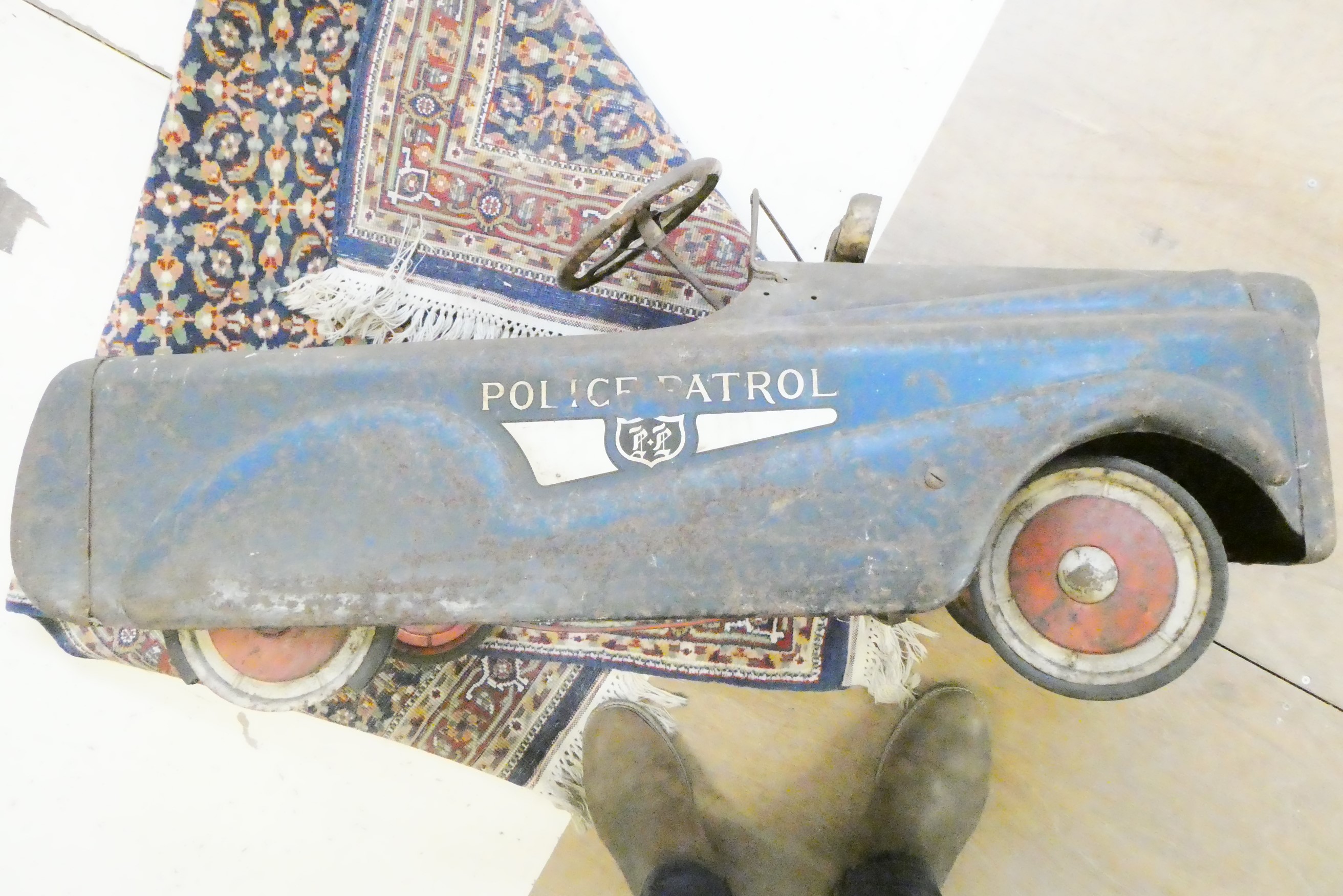 A pressed steel police patrol pedal car Image