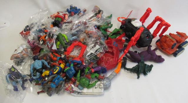 Plastic Action He-Man figure accessories including vehicles and animals Image