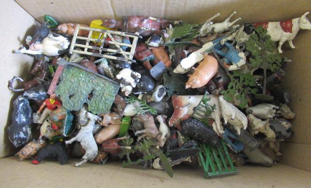 A large quantity of playworn lead farm animals and lead trees and gates Image