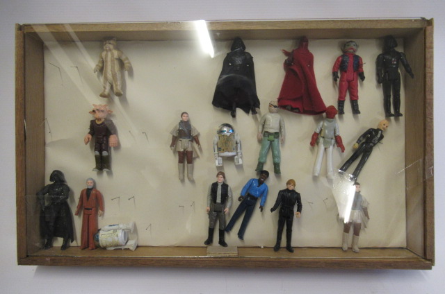 A display box containing eighteen Star Wars figures Image